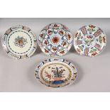 FOUR POLYCHROME DUTCH DELFT PLATES, MID-LATE 18TH CENTURY, boldly painted in blues, iron-reds,