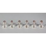 A SET OF SIX SILVER NOVELTY OWL MENU HOLDERS.