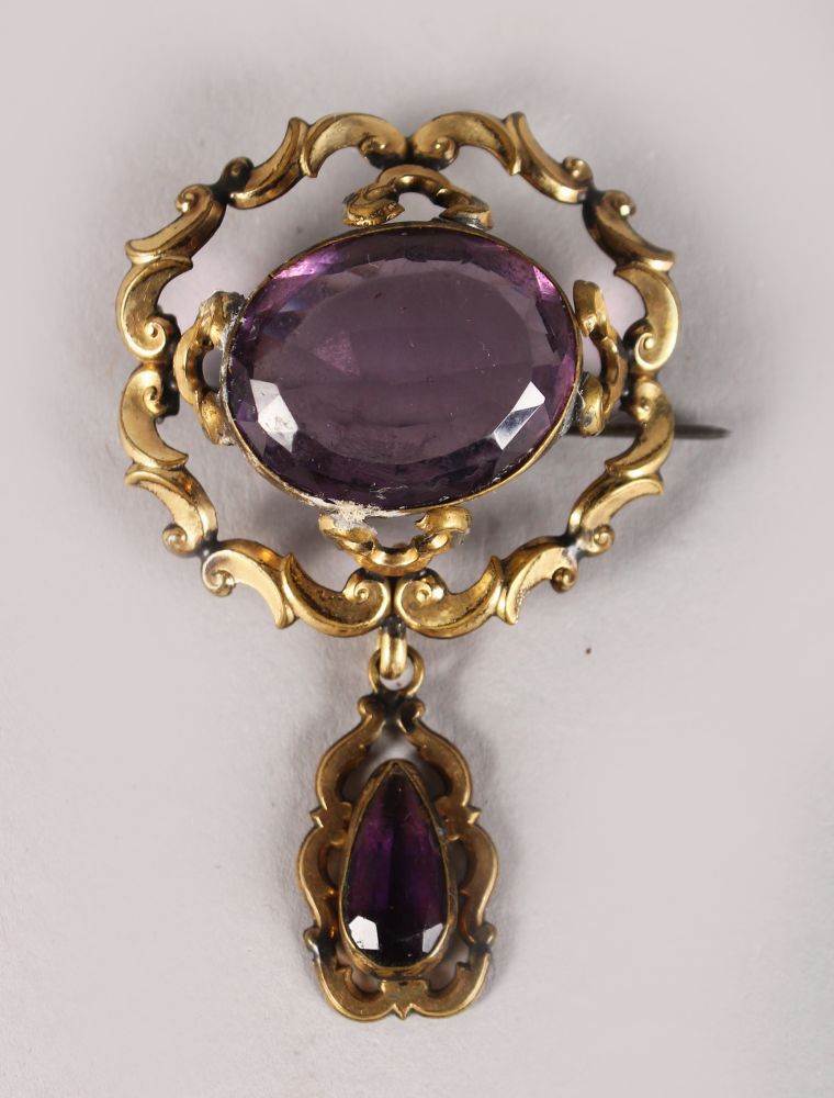 A VICTORIAN AMETHYST BROOCH.