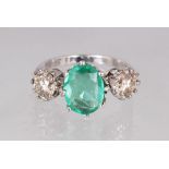 AN 18CT WHITE GOLD, EMERALD AND DIAMOND THREE STONE RING, 4.25cts approx.