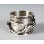 A RUSSIAN SILVER NAPKIN RING, engraved MARY 1916.