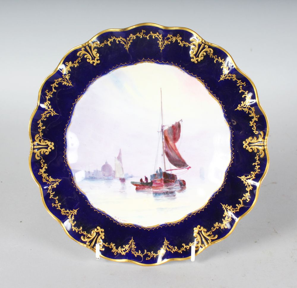 A ROYAL CROWN DERBY FINE PLATE painted with a fine sailing scene under a blue and raised gilt