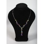 A SUPERB 18CT WHITE GOLD, PERIDOT, AMETHYST AND AQUAMARINE SET NECKLACE.