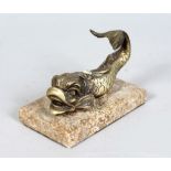 A GILT BRONZE DOLPHIN, on a rectangular marble base. 4ins long.