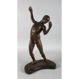 JOAN A BRONZE STANDING NUDE on a shaped base. Signed JOAN. AP 1/5. 24ins high.