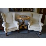 A PAIR OF GEORGE III DESIGN WINGED ARMCHAIRS