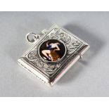 A .925 SILVER NOVELTY ENGRAVED VESTA with classical nude enamel.