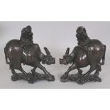 A PAIR OF 20TH CENTURY CHINESE WIRE INLAID WOOD BUFFALO & BOY GROUPS, 6.9in long & 8.5in high.