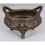A 19TH/20TH CENTURY CHINESE BRONZE TRIPOD DRAGON CENSER, weighing approx. 1.06Kg, the base cast with