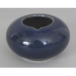 A SMALL CHINESE BLUE GLAZED PORCELAIN WATER POT, the base with a Yongzheng seal mark, 2.5in wide