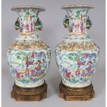A GOOD LARGE PAIR OF 19TH CENTURY CHINESE CANTON PORCELAIN VASES, mounted on ormolu stands, each