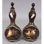 A PAIR OF JAPANESE MEIJI PERIOD LACQUER OVERLAY PORCELAIN GOURD BOTTLES & LACQUERED WOOD COVERS,