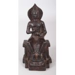 A THAI BRONZE FIGURE OF BUDDHA, seated on a plinth with a lotus foot rest, 6.75in high.