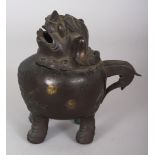 A CHINESE MING STYLE BUDDHISTIC LION BRONZE CENSER, the hinged head of the mythical animal forming