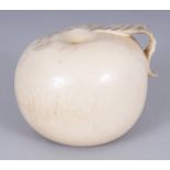 A GOOD JAPANESE MEIJI PERIOD IVORY OKIMONO OF AN APPLE, part of its skin peeled back, 2.25in wide at