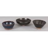 A GROUP OF THREE SONG STYLE JIAN WARE GLAZED CERAMIC BOWLS, the largest 5in diameter. (3)