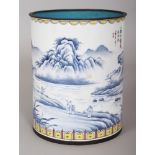 A CHINESE CANTON ENAMEL BRUSHPOT, the base with a Qianlong seal mark, 4.2in diameter at base & 5.3in