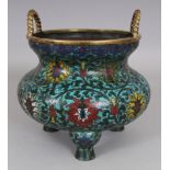 A GOOD CHINESE MING STYLE CLOISONNE TRIPOD CENSER, possibly early, decorated with formal scrolling