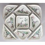 A 20TH CENTURY CHINESE CASED NINE PIECE FAMILLE ROSE PORCELAIN SUPPER SET, the wood box with an