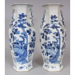 A LARGE PAIR OF 19TH CENTURY CHINESE BLUE & WHITE HEXAGONAL SECTION PORCELAIN VASES, each painted