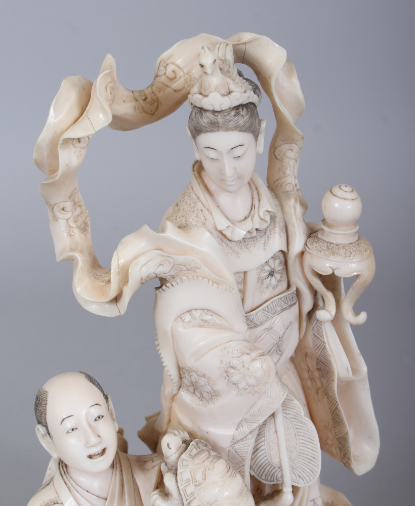 A FINE QUALITY SIGNED JAPANESE MEIJI PERIOD IVORY OKIMONO OF KWANNON, in the company of a kneeling - Image 5 of 8