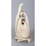 AN ORIENTAL IVORY CARVING OF A FINGER CITRON, 2.3in long.