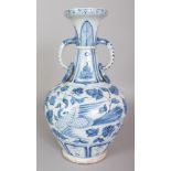 A CHINESE YUAN STYLE BLUE & WHITE PORCELAIN PHOENIX VASE, with moulded animal-head and ring handles,