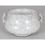 A CHINESE GE TYPE CRACKLEGLAZE PORCELAIN CENSER, 6.1in wide including handles & 4.4in diameter at