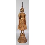 A GOOD LARGE 18TH/19TH CENTURY THAI GILDED & LACQUERED BRONZE FIGURE OF BUDDHA SHAKAMUNI, standing