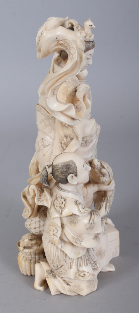 A FINE QUALITY SIGNED JAPANESE MEIJI PERIOD IVORY OKIMONO OF KWANNON, in the company of a kneeling - Image 2 of 8