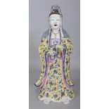 A LARGE 20TH CENTURY CHINESE FAMILLE ROSE PORCELAIN FIGURE OF GUANYIN, the Immortal dressed in