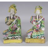 A PAIR OF 18TH CENTURY CHINESE FAMILLE ROSE PORCELAIN FIGURES OF GUANDI, one figure holding a brush,