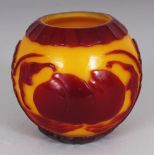 A SMALL 19TH CENTURY CHINESE YELLOW GROUND RED OVERLAY BEIJING GLASS BOWL, the globular body