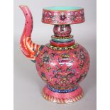 A CHINESE TIBETAN MARKET PINK GROUND PORCELAIN EWER & COVER, decorated with ribboned Buddhist