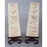 A PAIR OF GOOD QUALITY EARLY 20TH CENTURY CHINESE IVORY WRIST RESTS, together with fitted wood