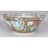 A GOOD LARGE 19TH CENTURY CHINESE CANTON PORCELAIN PUNCH BOWL, the sides painted with a continuous