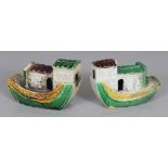 A PAIR OF CHINESE KANGXI PERIOD SANCAI PORCELAIN MODELS OF RIVER CRAFT, circa 1700, each base