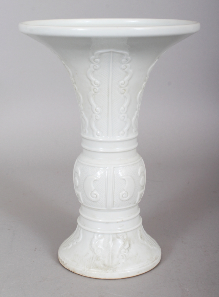 A CHINESE WHITE GLAZED PORCELAIN GU VASE, of archaic bronze design, the base with a Yongzheng seal - Image 2 of 7