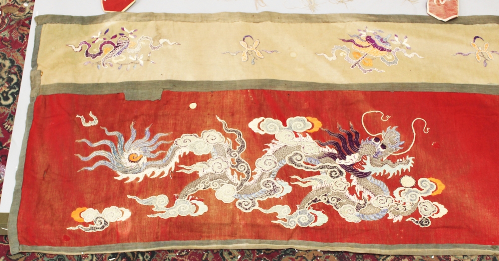 TWO SIMILAR EARLY 20TH CENTURY CHINESE SILK EMBROIDERED FABRIC WALL HANGINGS, decorated with dragons - Image 2 of 5