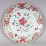 AN 18TH CENTURY CHINESE FAMILLE ROSE PORCELAIN PLATE, painted to its centre with peony and other