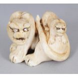 A SIGNED JAPANESE MEIJI PERIOD IVORY OKIMONO OF A TIGER & ITS CUB, the fur naturalistically