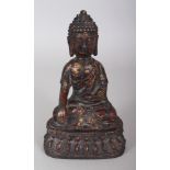 A SINO-TIBETAN GILT BRONZE OF BUDDHA, seated in dhyanasana on a lotus plinth, 7.4in high.