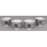 A GOOD GROUP OF FOUR CHINESE DAOGUANG PERIOD DOUCAI PORCELAIN TEA BOWLS, each painted with formal