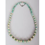 A TURQUOISE & PEARL NECKLACE, composed of graduated spherical beads, approx. 16.5in long.