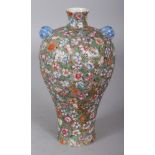 A GOOD QUALITY LATE 19TH CENTURY CHINESE MILLEFLEUR PORCELAIN VASE, the base with a Qianlong seal