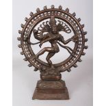 A 19TH/20TH CENTURY SOUTH INDIAN BRONZE FIGURE OF SHIVA, dancing on the dwarf Apasmara on a lotus