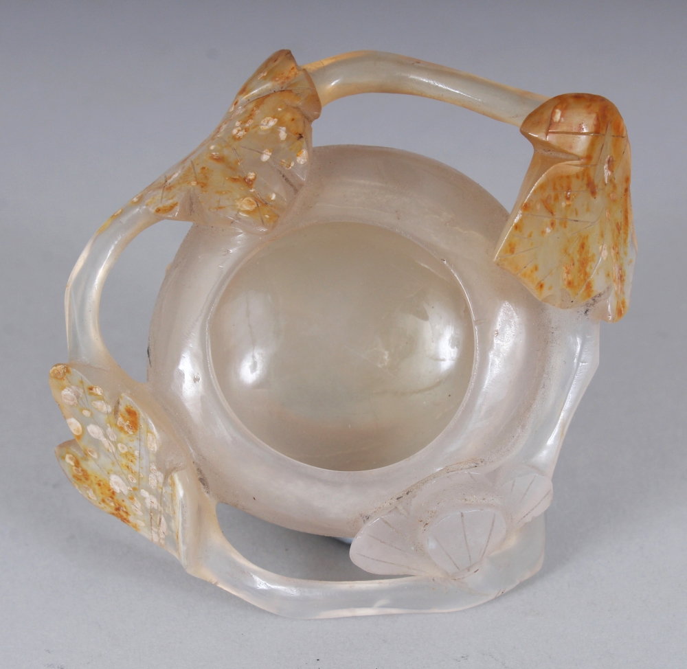 A SMALL CHINESE AGATE BRUSHWASHER, together with a fitted wood stand, carved in relief with - Image 5 of 7
