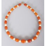 AN AMBER & IVORY NECKLACE, weighing approx. 16.5gm, composed of oval amber and spherical ivory