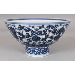 A CHINESE MING STYLE BLUE & WHITE PORCELAIN STEM BOWL, the sides decorated with the Eight Buddhist