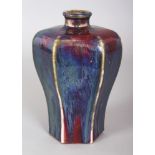 A GOOD 18TH CENTURY CHINESE FLAMBE GLAZED HEXAGONAL SECTION PORCELAIN VASE, the streaked red and